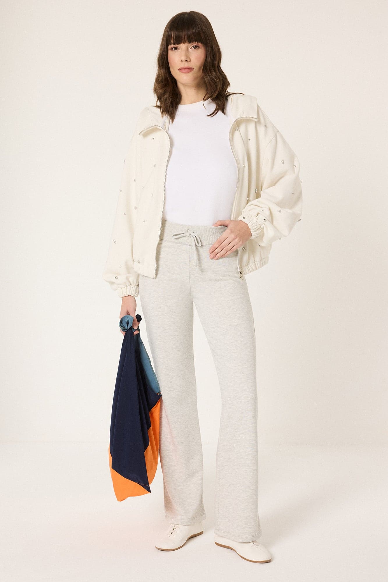 ELASTICATED WAIST, SLIGHTLY FLARED SWEATPANTS